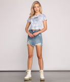 Destructed Glam Denim Mini Skirt provides a stylish start to creating your best summer outfits of the season with on-trend details for 2023!
