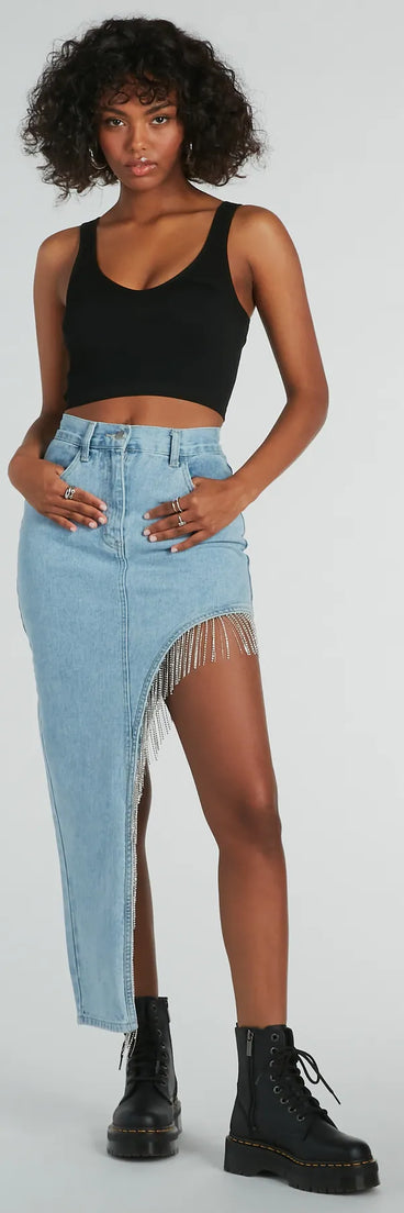 The denim wash and trendy design of the Glitzy Rhinestone Fringe High Slit Denim Maxi Skirt is a chic fall piece for any wardrobe, versatile for everyday wear.