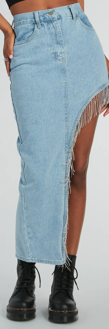 The denim wash and trendy design of the Glitzy Rhinestone Fringe High Slit Denim Maxi Skirt is a chic fall piece for any wardrobe, versatile for everyday wear.