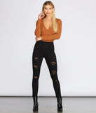 High Rise Edgy Destructed Skinny Jeans for 2022 festival outfits, festival dress, outfits for raves, concert outfits, and/or club outfits