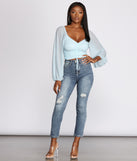 High Rise Distressed Tapered Jeans provides a stylish start to creating your best summer outfits of the season with on-trend details for 2023!
