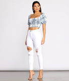 High Rise Destructed Denim Skinny Jeans provides a stylish start to creating your best summer outfits of the season with on-trend details for 2023!