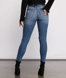 Mid-Rise Destructed Skinny Jeans provides a stylish start to creating your best summer outfits of the season with on-trend details for 2023!
