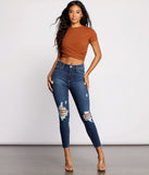 High Rise Destructed Cropped Skinny Jeans provides a stylish start to creating your best summer outfits of the season with on-trend details for 2023!