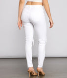 Jude Mid-Rise Destructed Knee Skinny Jeans provides a stylish start to creating your best summer outfits of the season with on-trend details for 2023!