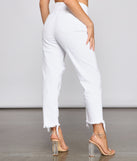 High-Rise Destructed And Frayed Mom Jeans provides a stylish start to creating your best summer outfits of the season with on-trend details for 2023!