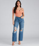 Distressed, But Well Dressed Boyfriend Jeans for 2023 festival outfits, festival dress, outfits for raves, concert outfits, and/or club outfits