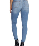 Distressed To Impress Skinny Jeans provides a stylish start to creating your best summer outfits of the season with on-trend details for 2023!