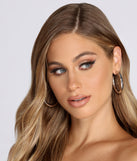 With Sleek Tube Hoops as your homecoming jewelry or accessories, your 2023 Homecoming dress look will be fire!
