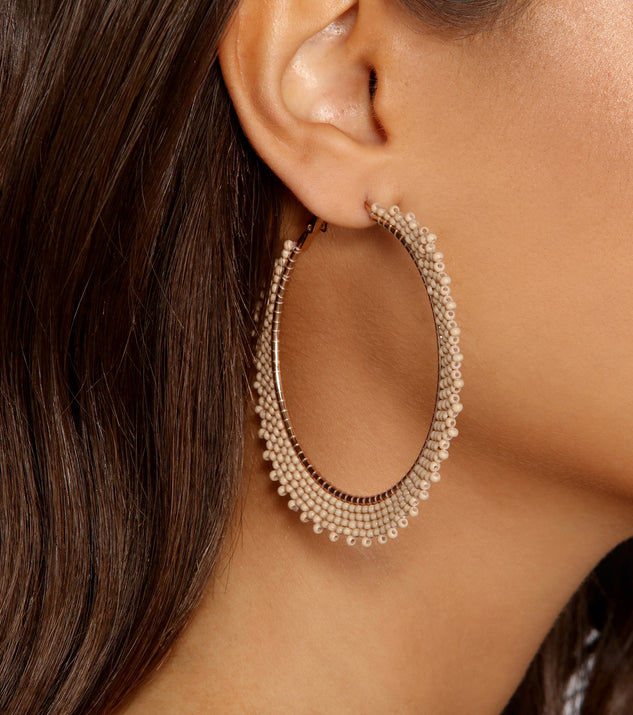 Beaded Babe Hoop Earrings is a trendy pick to create 2023 festival outfits, festival dresses, outfits for concerts or raves, and complete your best party outfits!