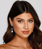 With Mesmerizing Shine Cubic Zirconia Teardrop Earrings as your homecoming jewelry or accessories, your 2023 Homecoming dress look will be fire!