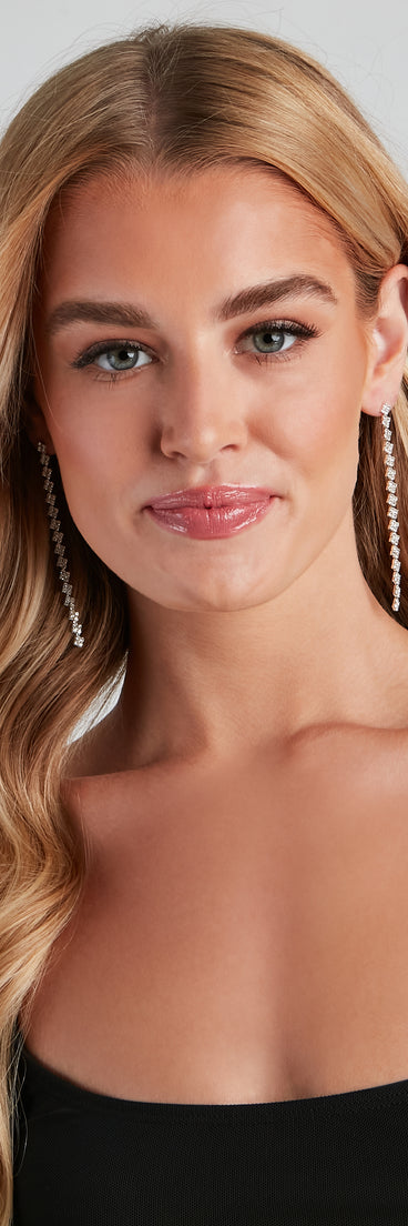 Clearly Chic Long Rhinestone Earrings creates the perfect New Year’s Eve Outfit or new years dress with stylish details in the latest trends to ring in 2023!