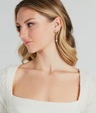 Pretty And Chic 14K Gold Plated Pearl Charm Earrings with on-trend details provides a stylish start to creating your graduation outfit for the 2024 Commencement or grad party!