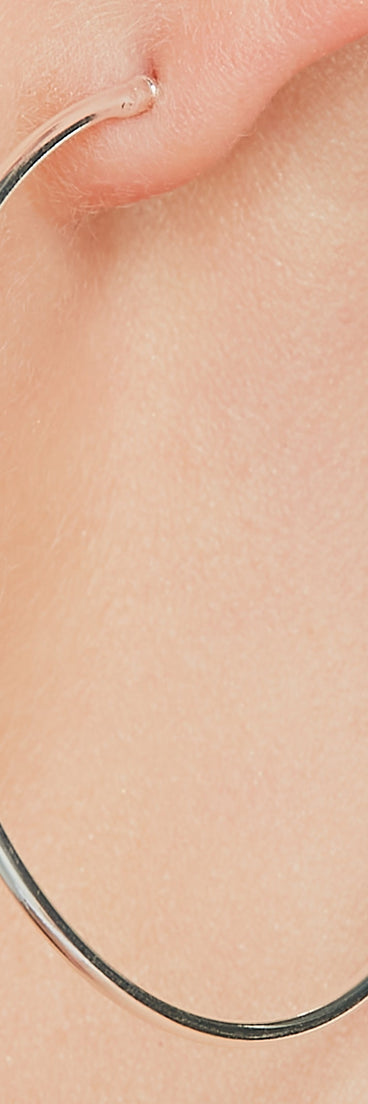 Luxe Allure Sterling Silver Plated Cubic Zirconia Hoop Earrings is a fire pick to create a concert outfit, 2024 festival looks, outfits for raves, or to complete your best party outfits or clubwear!