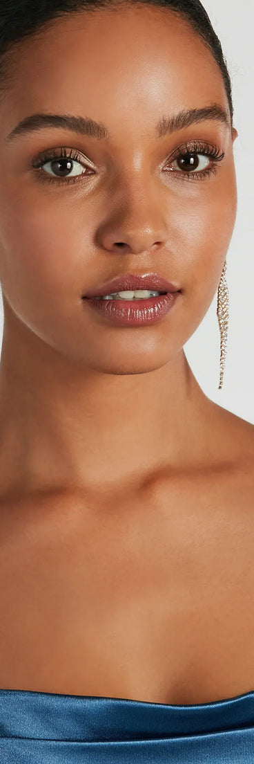 Homecoming jewelry and accessories like the Glitzy Allure Rhinestone Twisted Fringe Earrings provide the finishing touch to help you dazzle at HOCO 2024!