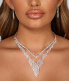 Layer on the Luxe Rhinestone Collar and Duster Earring Set creates the perfect New Year’s Eve Outfit or new years dress with stylish details in the latest trends to ring in 2023!