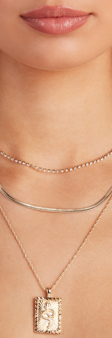 Slither & Shine Three-Pack Necklace Set is a trendy pick to create 2023 festival outfits, festival dresses, outfits for concerts or raves, and complete your best party outfits!