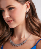 With Feeling Glitzy Rhinestone Necklace And Earrings Set as your homecoming jewelry or accessories, your 2023 Homecoming dress look will be fire!