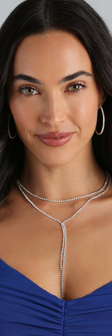 Homecoming jewelry and accessories like the Layered In Rhinestone Lariat Necklace provide the finishing touch to help you dazzle at HOCO 2024!