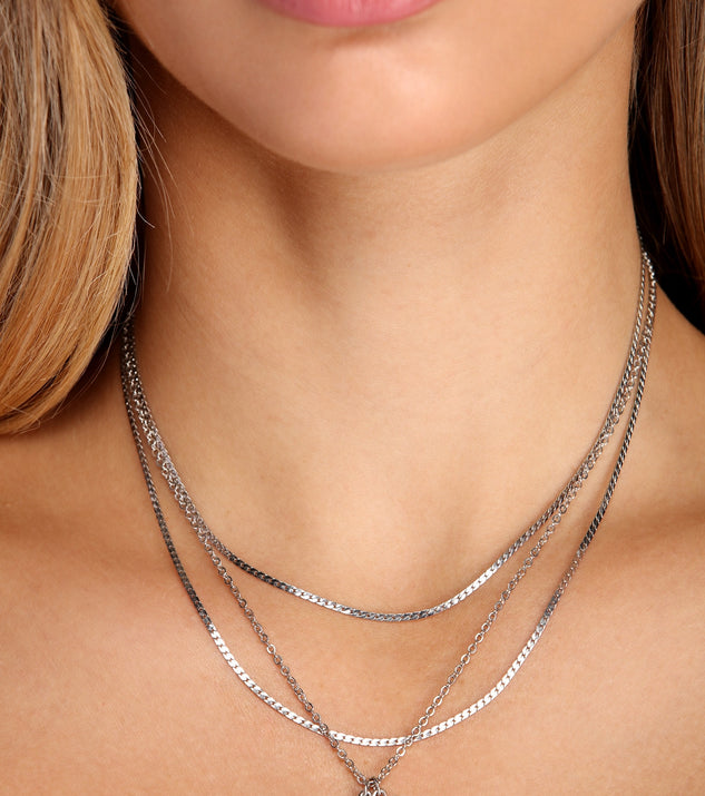 Layered outlet charm necklace
