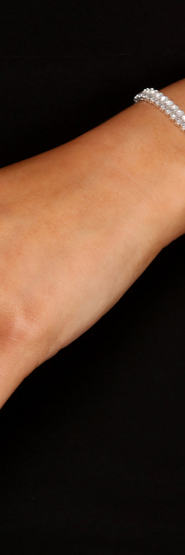 Charming Cubic Zirconia Baguette Bracelet is a stunning choice for a bridesmaid dress or maid of honor dress, and to feel beautiful at Homecoming 2023, fall or winter weddings, formals, & military balls!