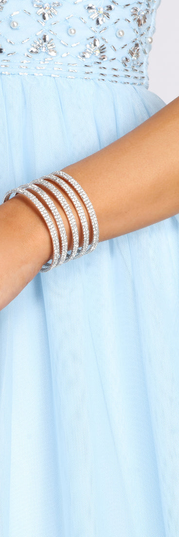 With Glistening Evenings Rhinestone Cuff Bracelet as your homecoming jewelry or accessories, your 2023 Homecoming dress look will be fire!