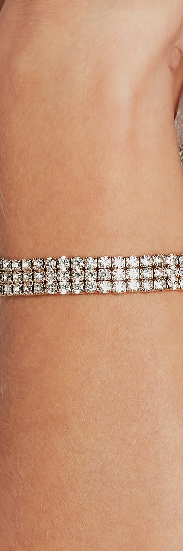 Homecoming jewelry and accessories like the Glitzy Shimmer Rhinestone Stretch Bracelet provide the finishing touch to help you dazzle at HOCO 2024!