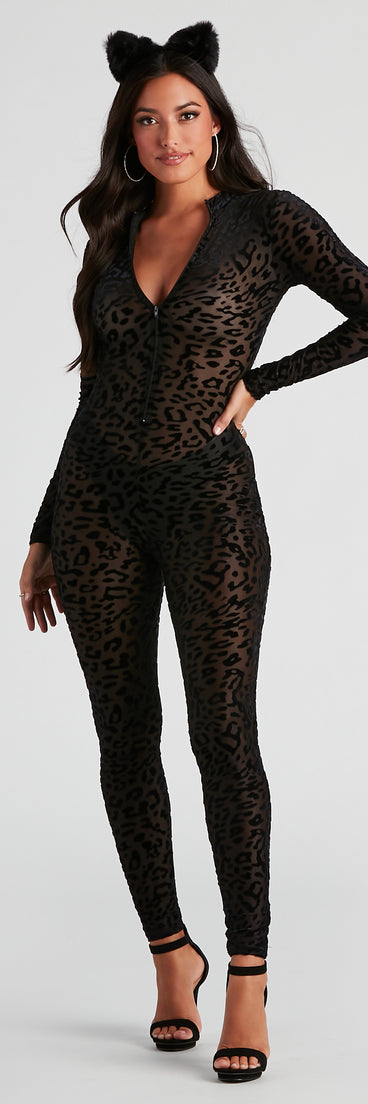 Women's cat costume from Windsor styled with a leopard print catsuit, faux fur costume cat ears, hoop earrings, and black platform heels