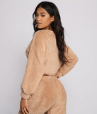 You’ll look stunning in the Cozy Cutie Sherpa Pajama Crop Top when paired with its matching separate to create a glam clothing set perfect for parties, date nights, concert outfits, back-to-school attire, or for any summer event!