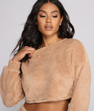 You’ll look stunning in the Cozy Cutie Sherpa Pajama Crop Top when paired with its matching separate to create a glam clothing set perfect for parties, date nights, concert outfits, back-to-school attire, or for any summer event!