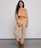 You’ll look stunning in the Cozy Cutie Sherpa Pajama Crop Top when paired with its matching separate to create a glam clothing set perfect for parties, date nights, concert outfits, back-to-school attire, or for any summer event!