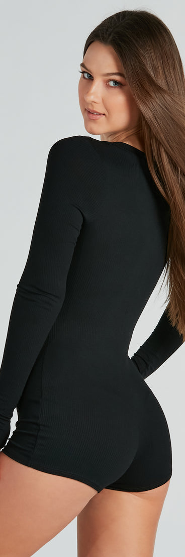 The Beauty Sleep Pajama Romper is an elevated one-piece that blends comfort with playful charm, perfect for a casual or laid-back normcore outfit.