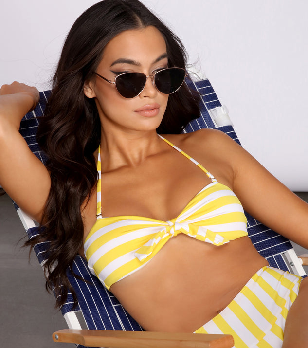 With fun and flirty details, Island In The Sun Bow Front Swim Top shows off your unique style for a trendy outfit for the summer season!