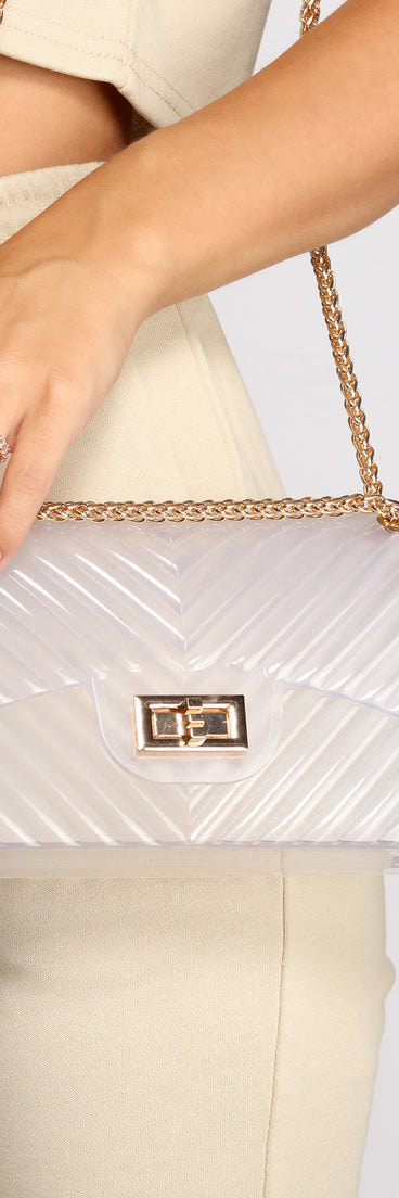 Top It All Off Clear Jelly Crossbody Purse is the perfect Homecoming look pick with on-trend details to make the 2023 HOCO dance your most memorable event yet!