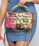 Graffiti Glam Crossbody is a trendy pick to create 2023 festival outfits, festival dresses, outfits for concerts or raves, and complete your best party outfits!