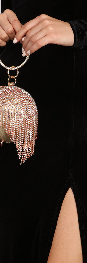 Glam Up The Night Rhinestone Fringe Sphere Clutch creates the perfect New Year’s Eve Outfit or new years dress with stylish details in the latest trends to ring in 2023!