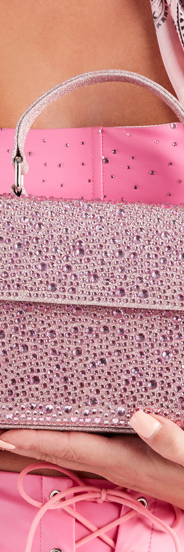 All This Shimmer Pink Glitter Rhinestone Handbag completes your look or your iconic fashion doll costume for Halloween 2023.