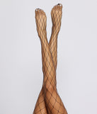Statement Fishnet Tights provides essential lift and support for creating your best summer outfits of the season for 2023!