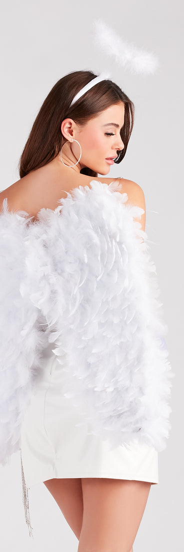 Back view of white feather angel wings styled as a white angel costume for women.