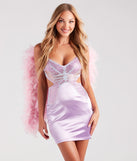 Adult Butterfly Costume from Windsor with a cutout dress with a embellished butterfly pattern and pink feather fairy wings.