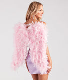 Back view of pink feather angel wings styled as an adult butterfly costume