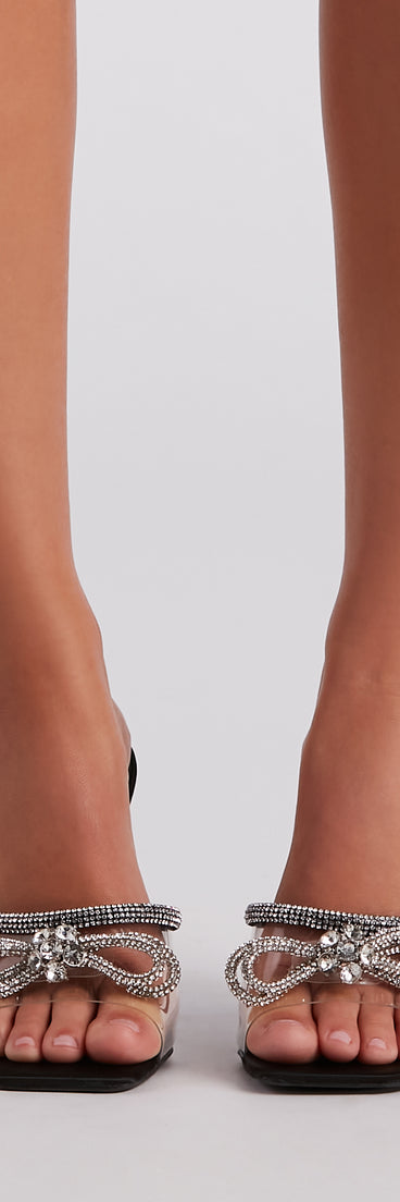 Livin' The Glam Life Rhinestone Bow Mules are chic ladies' shoes to complete your best 2023 outfits. They come in a variety of trendy women's shoe styles like platforms and dressy low-heels, & are available in wide widths for better comfort.