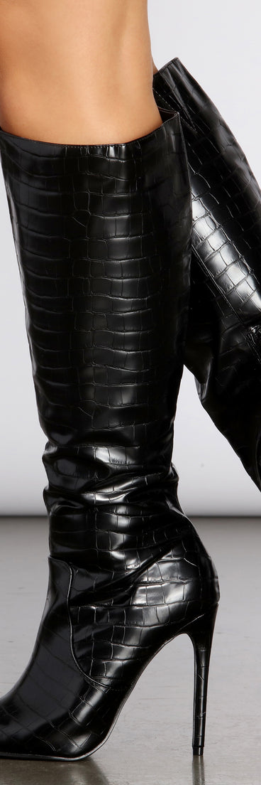 Knee-High Reptilian Stiletto Boots are chic ladies' shoes to complete your best 2023 outfits. They come in a variety of trendy women's shoe styles like platforms and dressy low-heels, & are available in wide widths for better comfort.