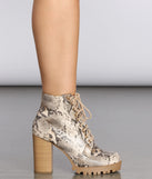 In The Nude Stacked Snake Boot for 2022 festival outfits, festival dress, outfits for raves, concert outfits, and/or club outfits