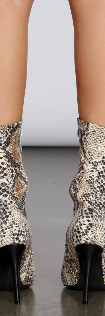 Sequin Stiletto Snake Booties are chic ladies' shoes to complete your best 2023 outfits. They come in a variety of trendy women's shoe styles like platforms and dressy low-heels, & are available in wide widths for better comfort.
