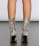 Sequin Stiletto Snake Booties are chic ladies' shoes to complete your best 2023 outfits. They come in a variety of trendy women's shoe styles like platforms and dressy low-heels, & are available in wide widths for better comfort.