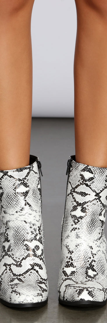 Stunning Snake Booties are chic ladies' shoes to complete your best 2023 outfits. They come in a variety of trendy women's shoe styles like platforms and dressy low-heels, & are available in wide widths for better comfort.