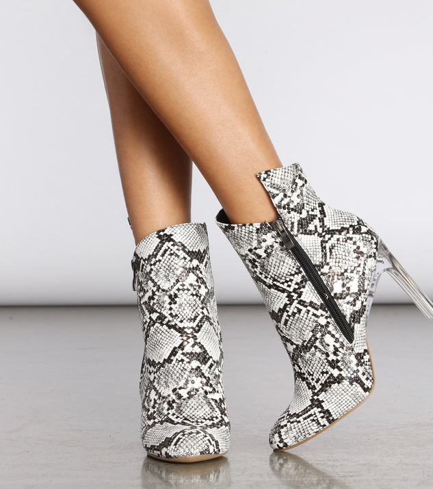 Come Thru Snake Print Clear Heeled Booties are chic ladies' shoes to complete your best 2023 outfits. They come in a variety of trendy women's shoe styles like platforms and dressy low-heels, & are available in wide widths for better comfort.