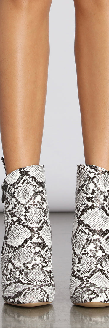 Come Thru Snake Print Clear Heeled Booties are chic ladies' shoes to complete your best 2023 outfits. They come in a variety of trendy women's shoe styles like platforms and dressy low-heels, & are available in wide widths for better comfort.