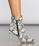 Come Thru Snake Print Clear Heeled Booties are chic ladies' shoes to complete your best 2023 outfits. They come in a variety of trendy women's shoe styles like platforms and dressy low-heels, & are available in wide widths for better comfort.
